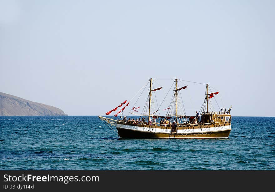 Cruiser with tourists in sea