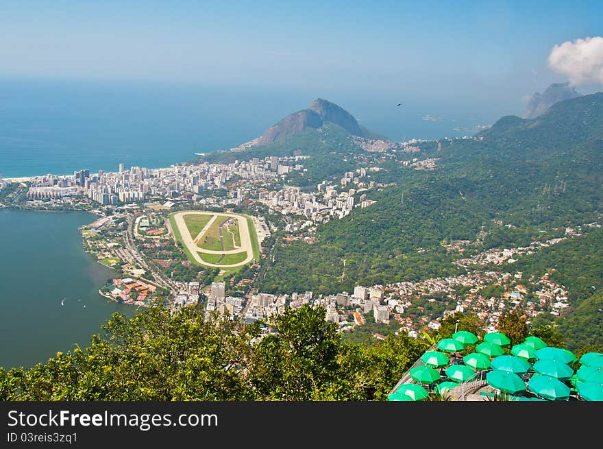 Panoramic view of the city,ocean and racetrack from Corcovado Mountain. Panoramic view of the city,ocean and racetrack from Corcovado Mountain.