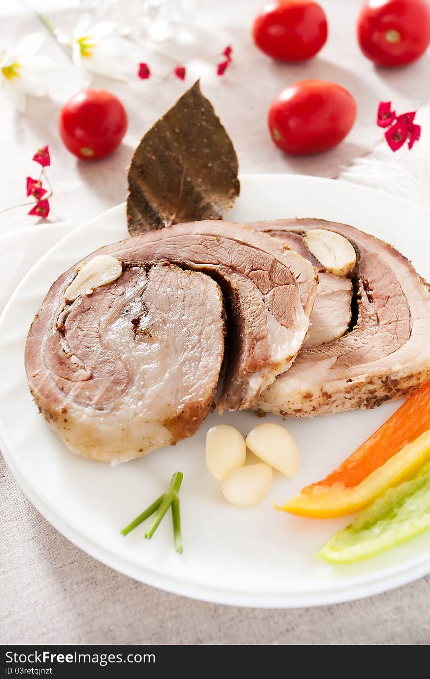 Sliced beef roll on a plate