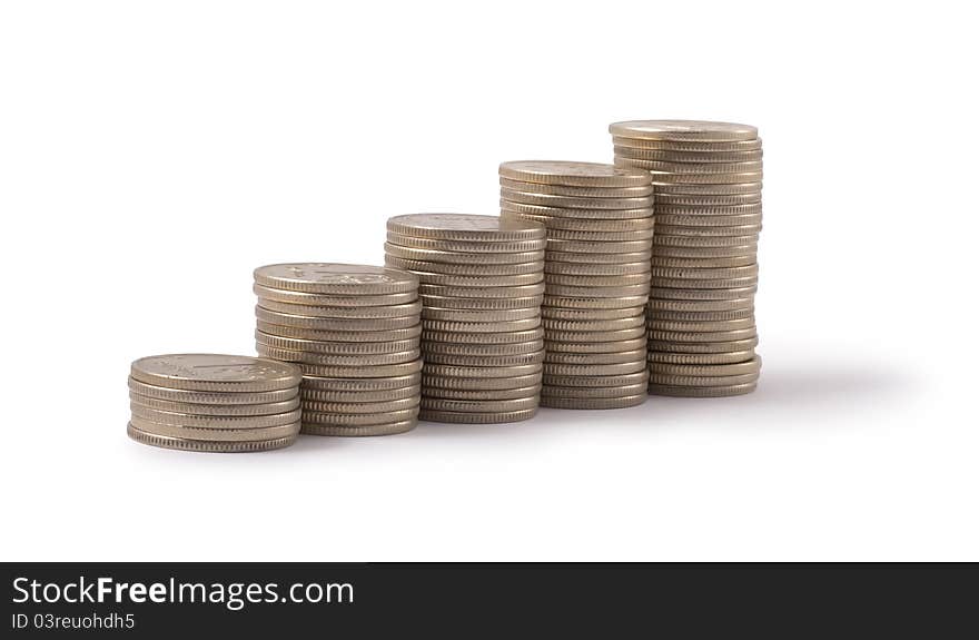 Silver and gold coins on a white background. Silver and gold coins on a white background