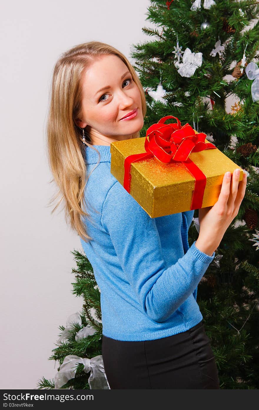 Happy woman with gift-box