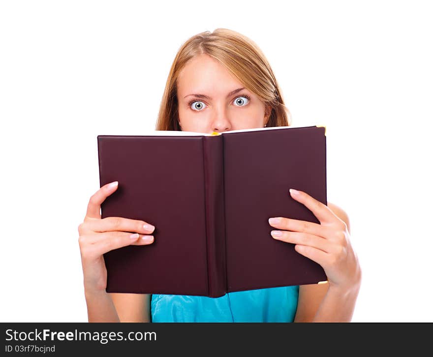 Portrait of young woman amazed by what she is reading isolated