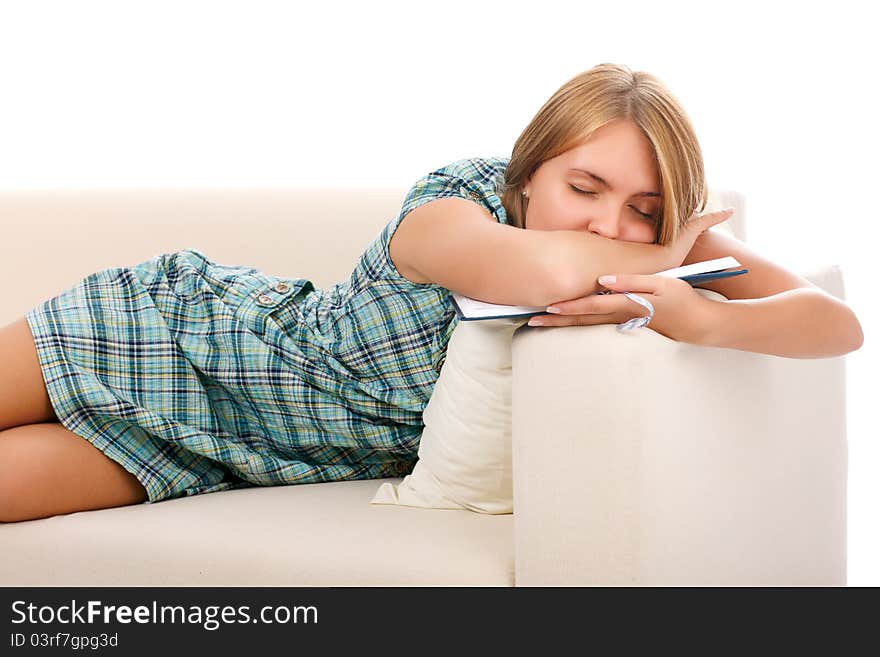 Beautiful woman sleeps with the book