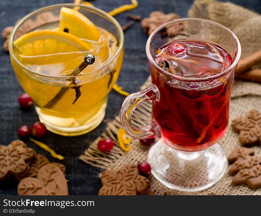 Hot drinks with cranberries and orange. Selective focus