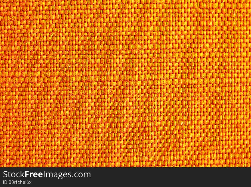 Close up of orange fabric texture for background