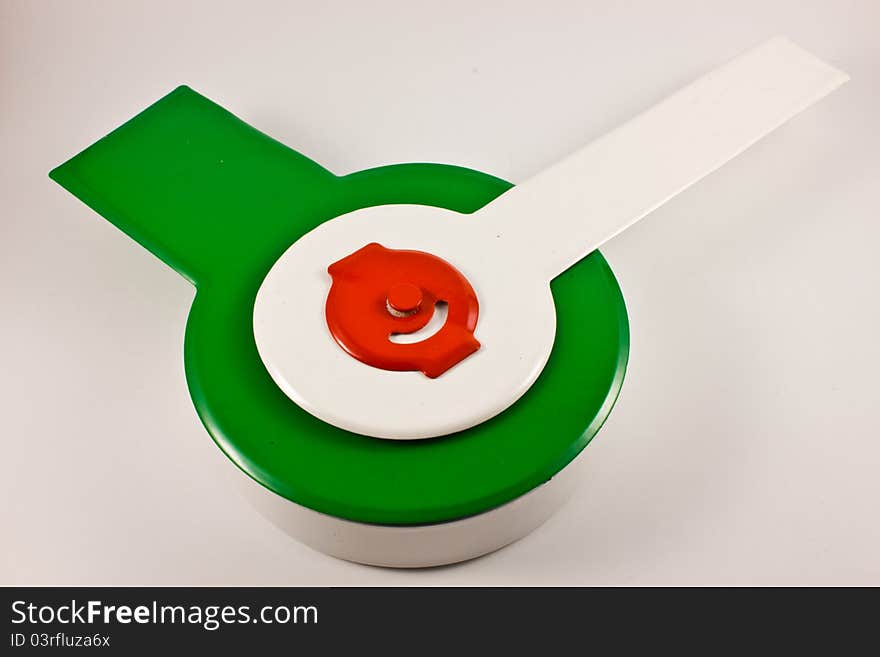 Modern clock with green needle on white background