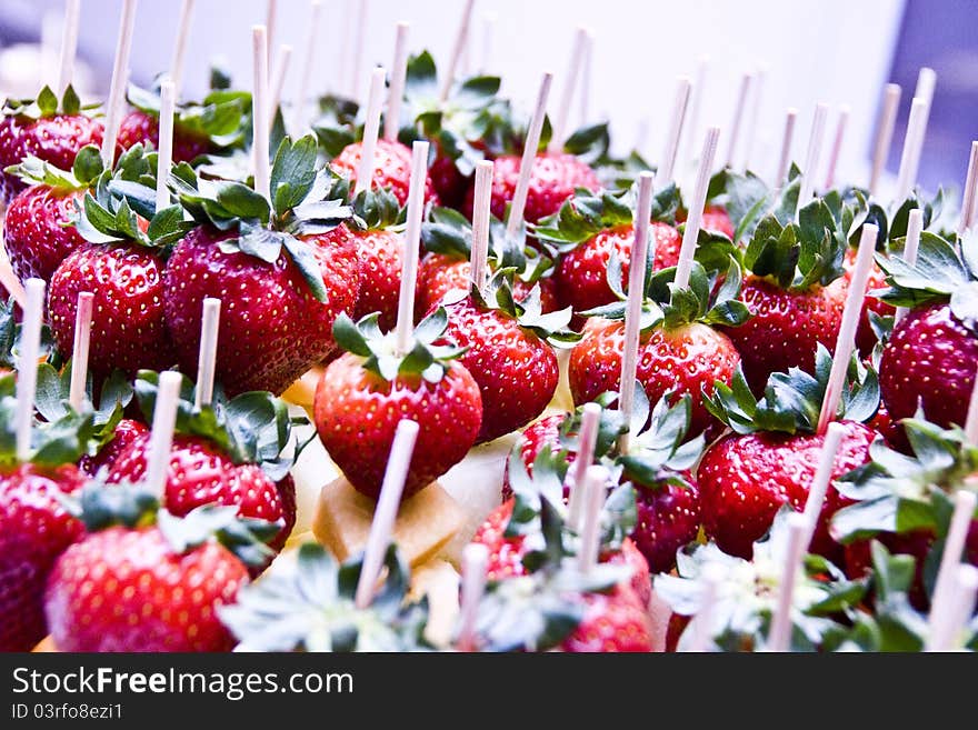 A macro view of assorted strawberries