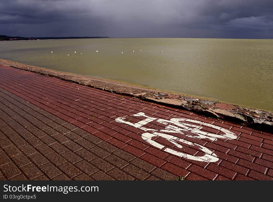 Bicycle track on the sea bay