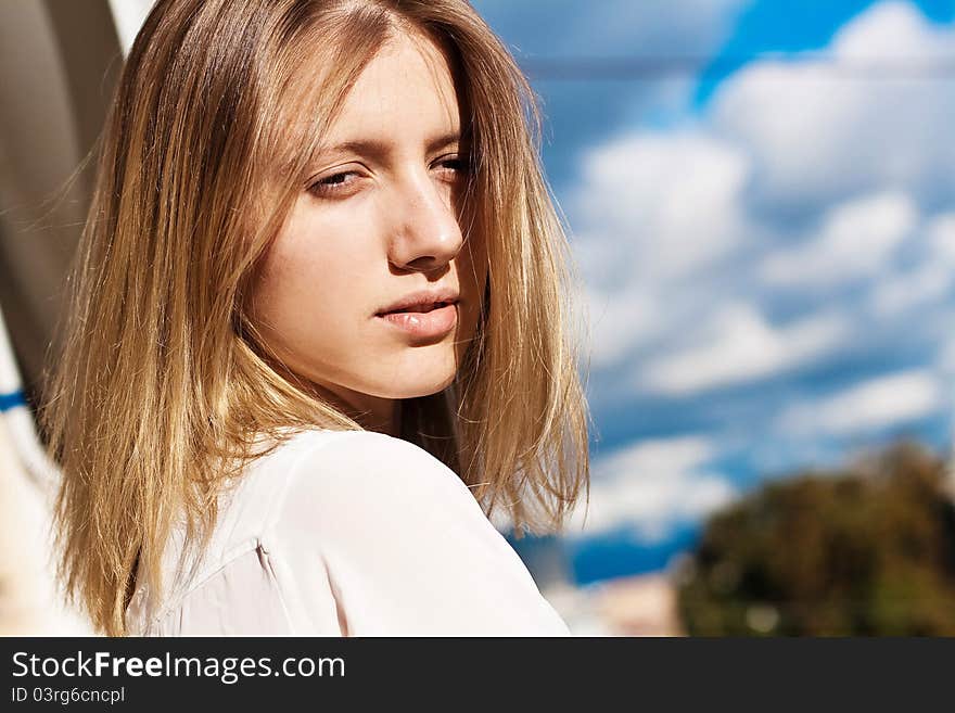 Portrait of beautiful woman on street