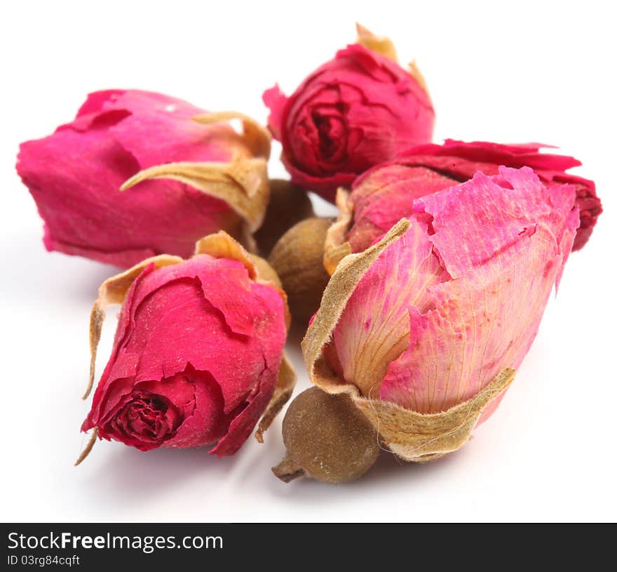 Heap of tea roses isolated on a white background. Heap of tea roses isolated on a white background.