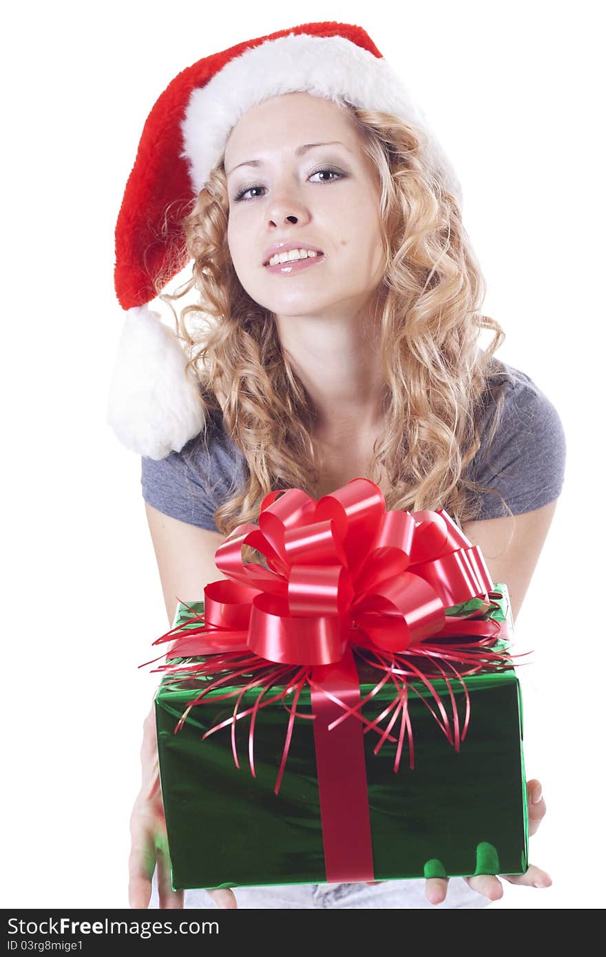 Pretty blond Santa girl with a present gift for New Year