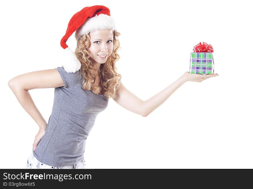 Pretty blond Santa girl with a present gift for New Year