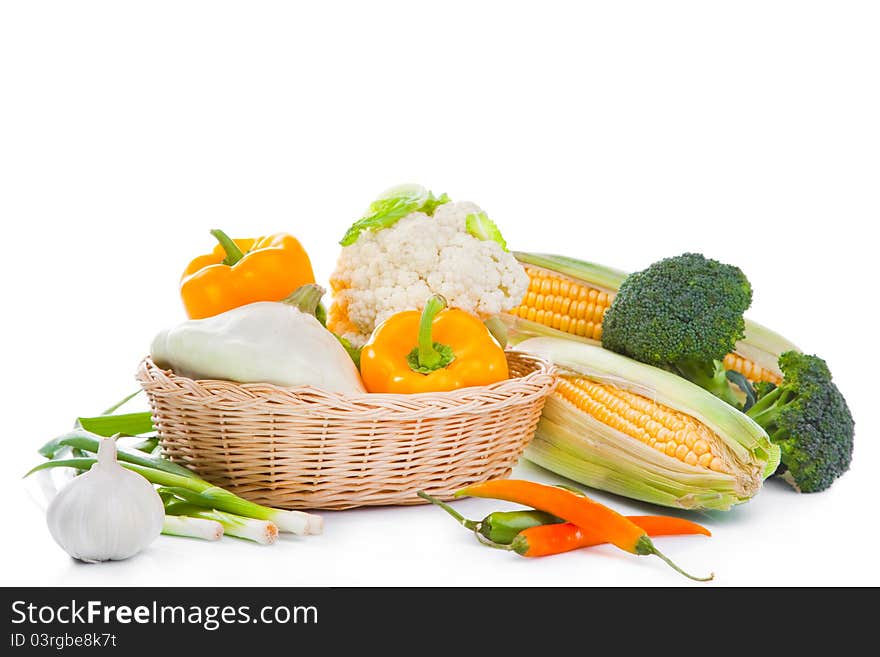 Still-life of autumn harvest with yellow and green colors on isolated white background. Still-life of autumn harvest with yellow and green colors on isolated white background