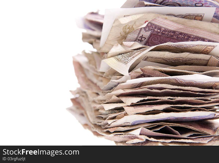 Stack of Chinese currency close-up isolated on the white