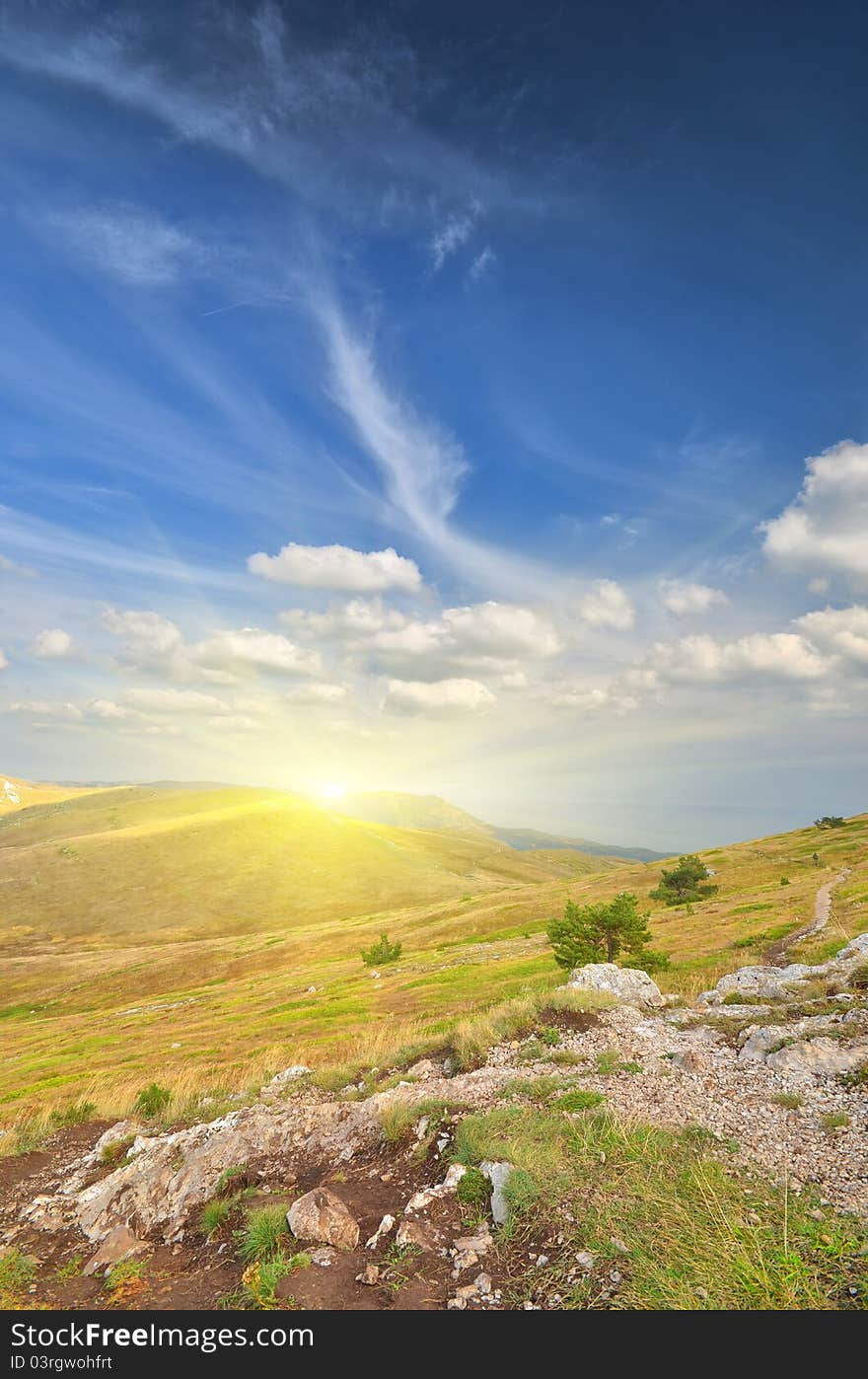 Top of the mountain on the background of the cloudy sky. natural composition