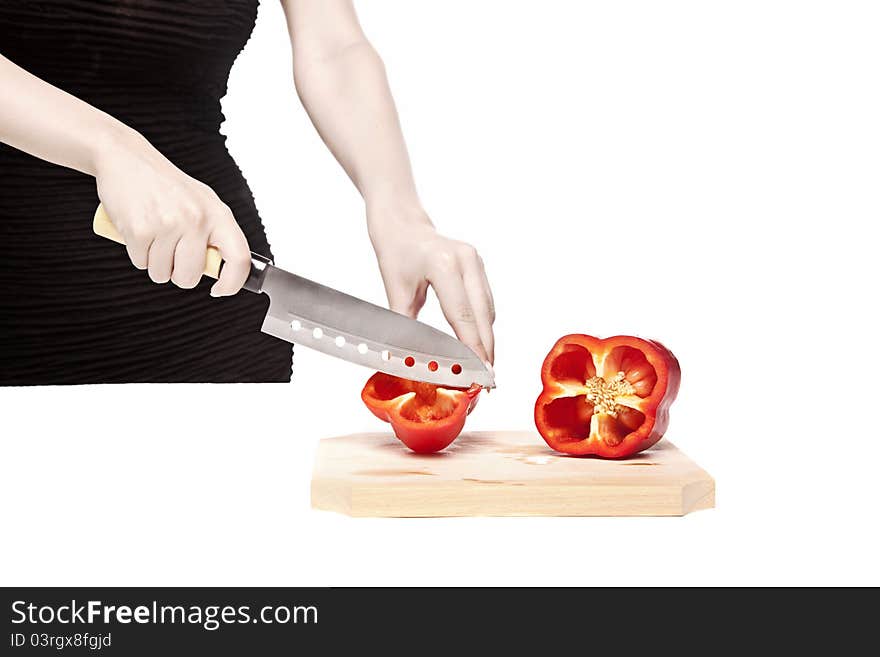 Woman Cutting A Delicious Red Pepper