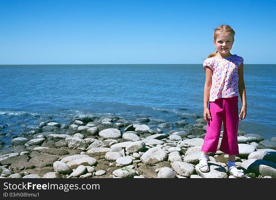 Girl child at the sea