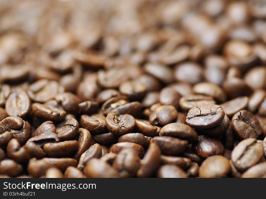 Macro image of decaffinated coffee beans.