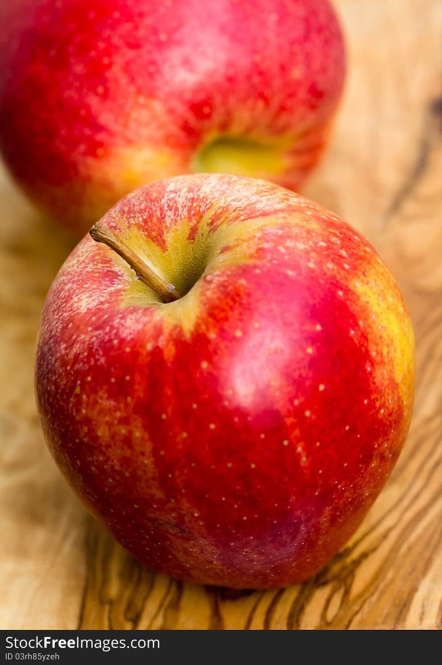 Apples on wooden table in garden. Apples on wooden table in garden.