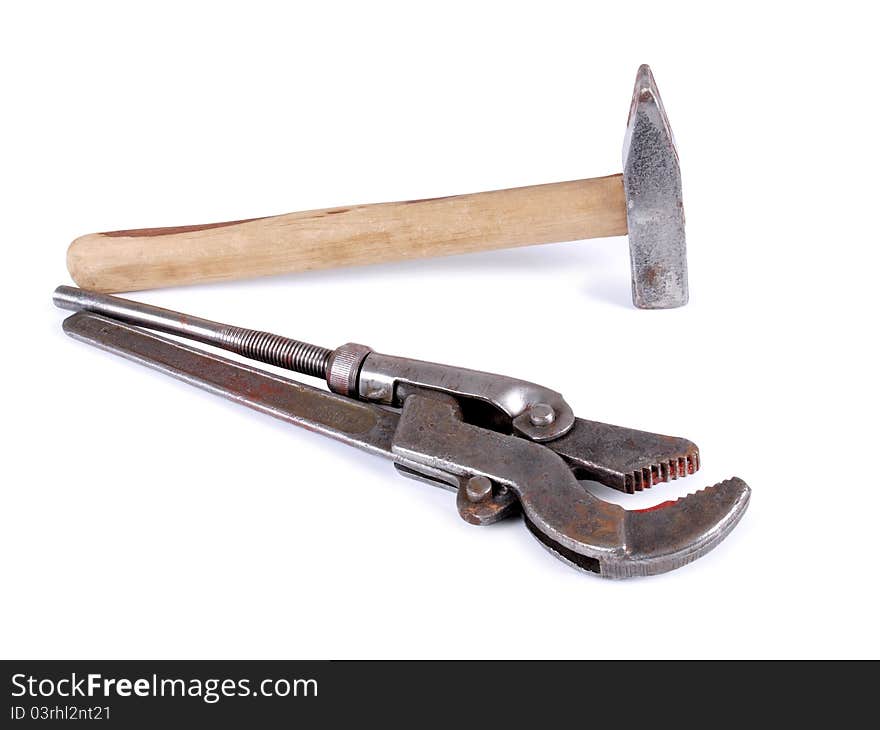 Color photo of a metal wrench and hammer