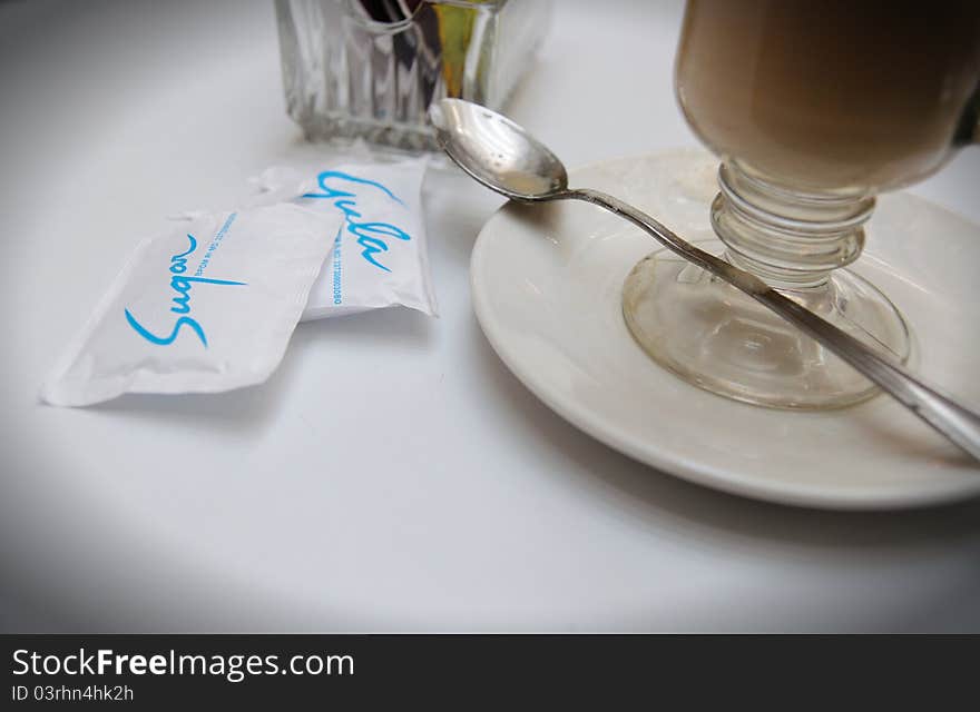 Picture of sugar and coffee on a table. Picture of sugar and coffee on a table