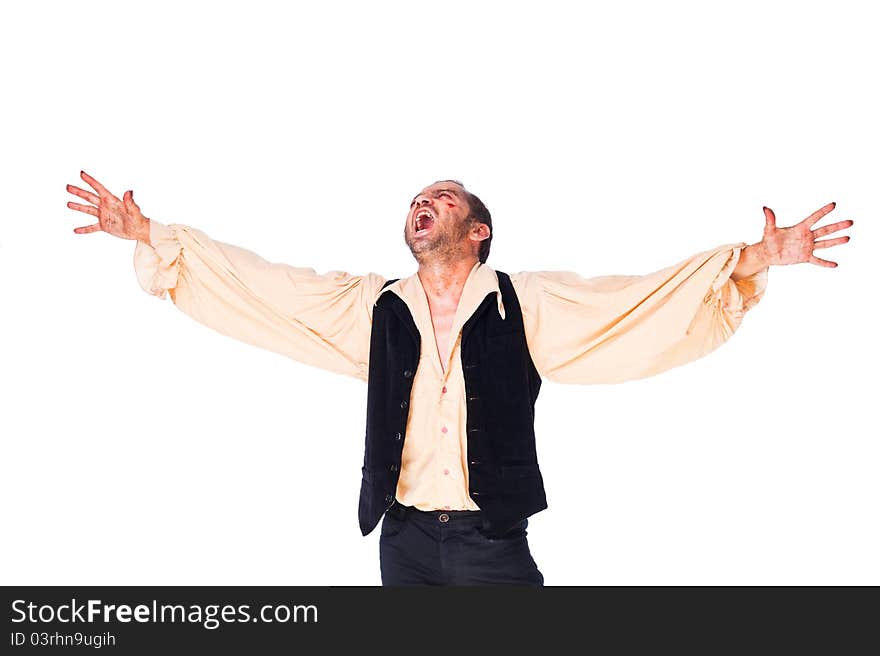 Male vampire roaring with arms raised, looking up on white background