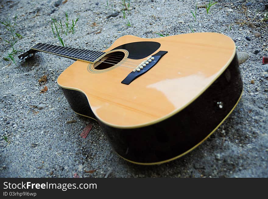 Guitar On The Sand