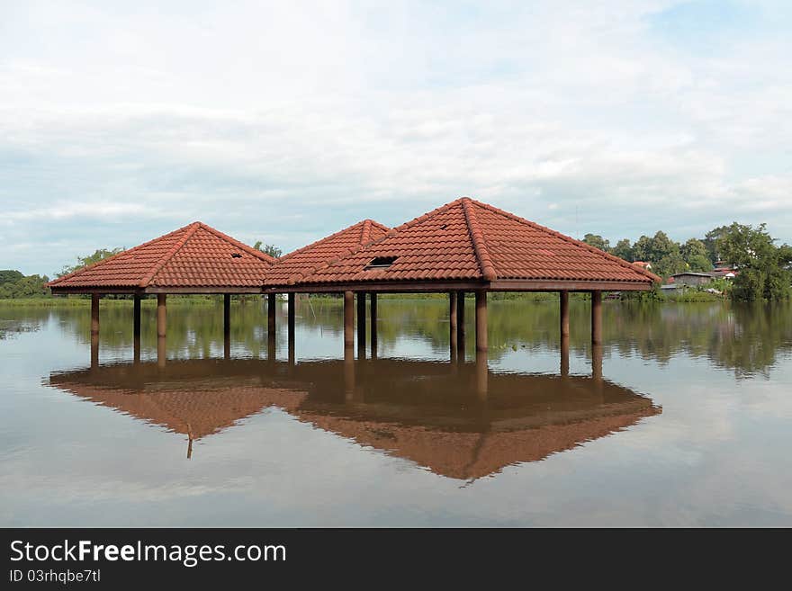 Old houses along the river that floods in some parts. Old houses along the river that floods in some parts.