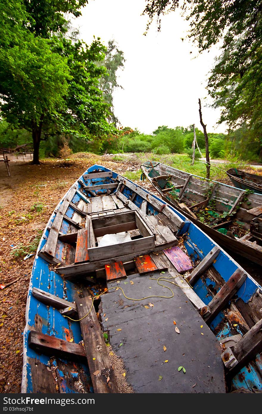 Old fishing boat on ground