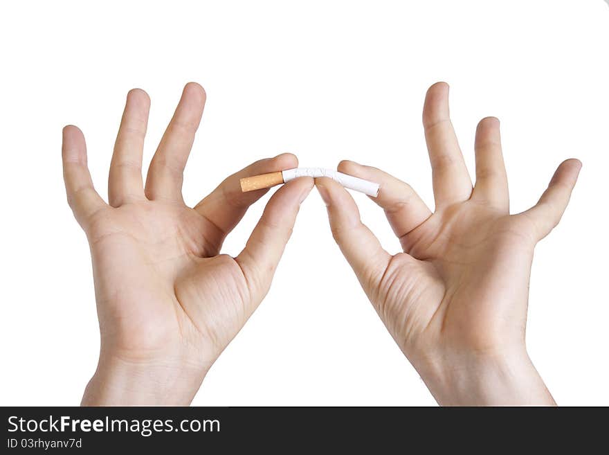 Man S Hands Breaking A Cigarette