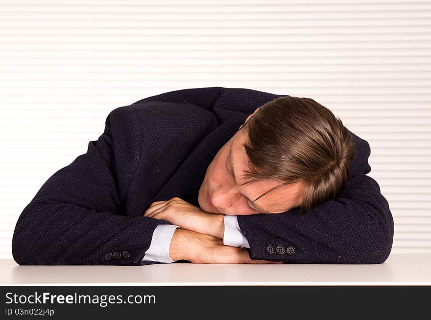 Portrait of a businessman posing at office. Portrait of a businessman posing at office