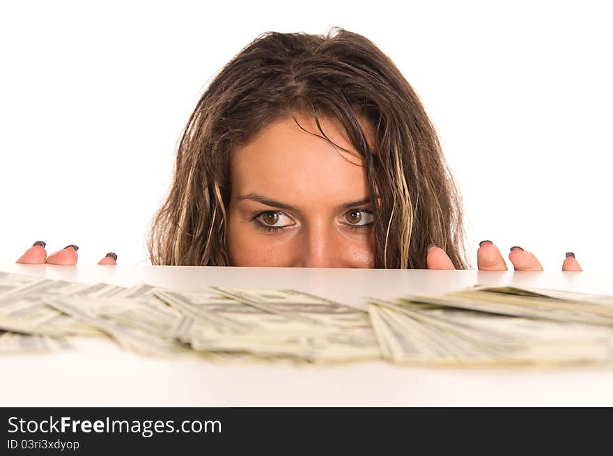 Portrait of a cute girl with money at table. Portrait of a cute girl with money at table