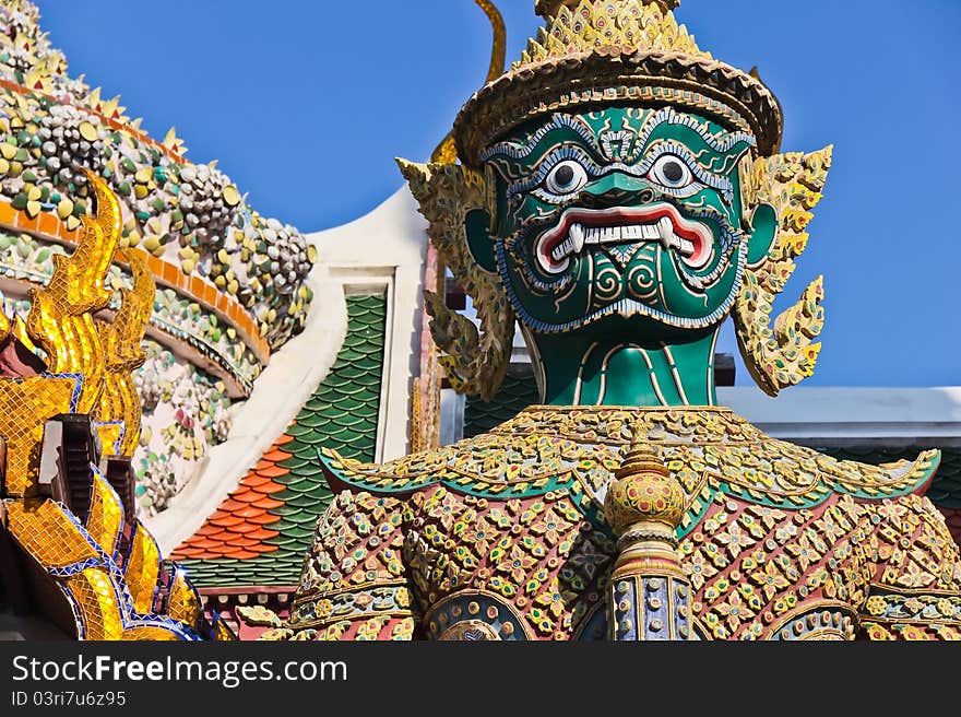 Green demon gate guardian at Wat Pra Kaew, named Intarachit. Green demon gate guardian at Wat Pra Kaew, named Intarachit