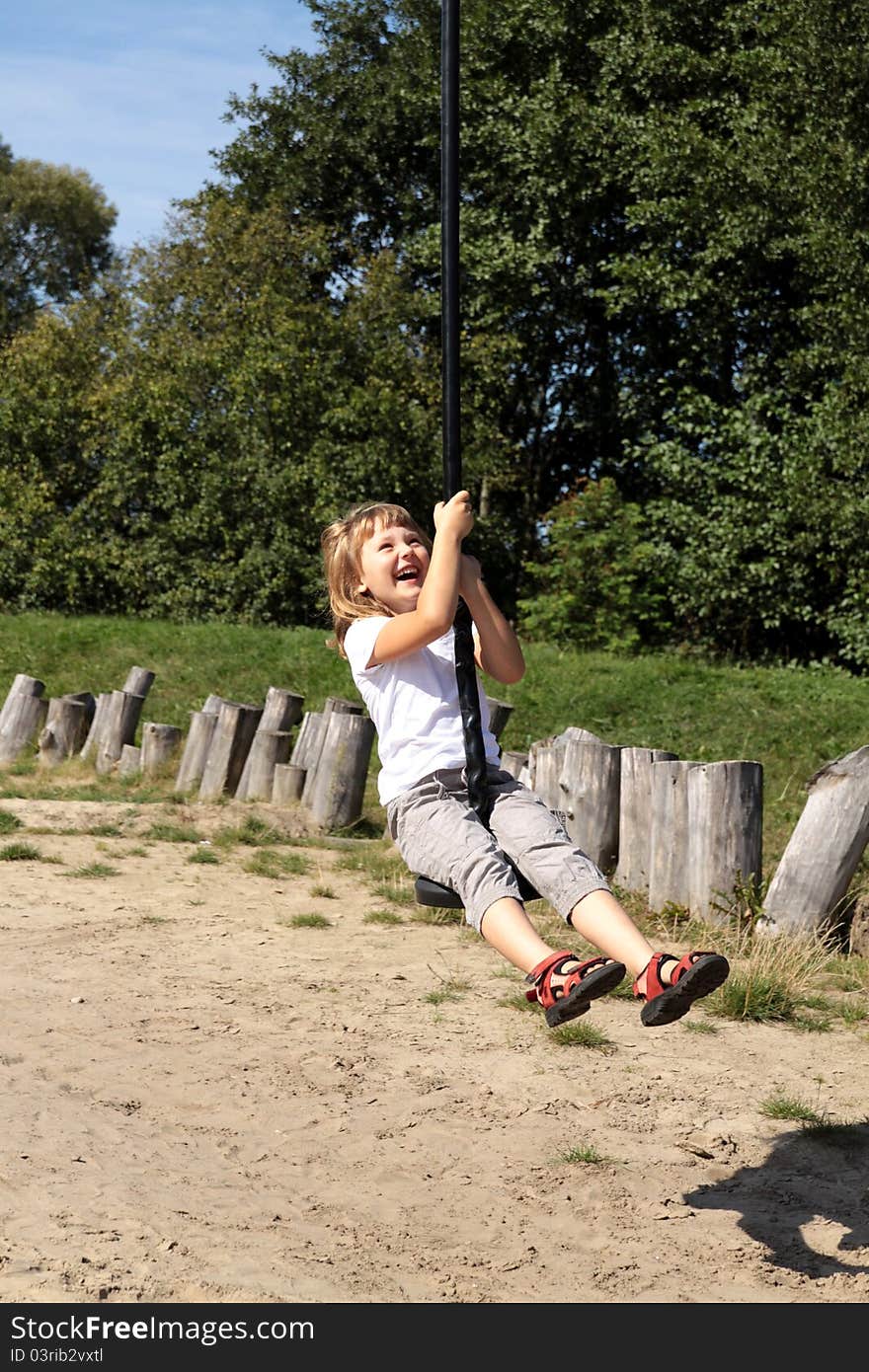 The girl pulls on a rope