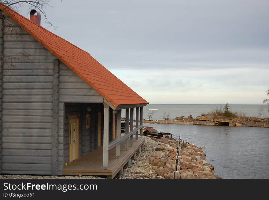 Small wooden house at the seashore. Small wooden house at the seashore