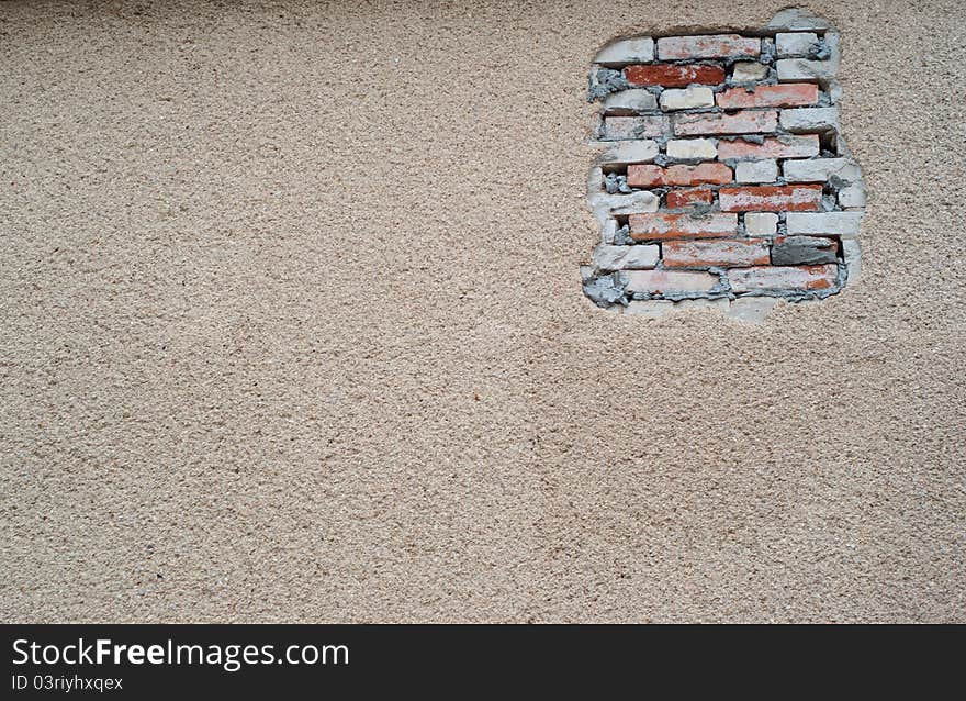 Cracked plaster and brick texture