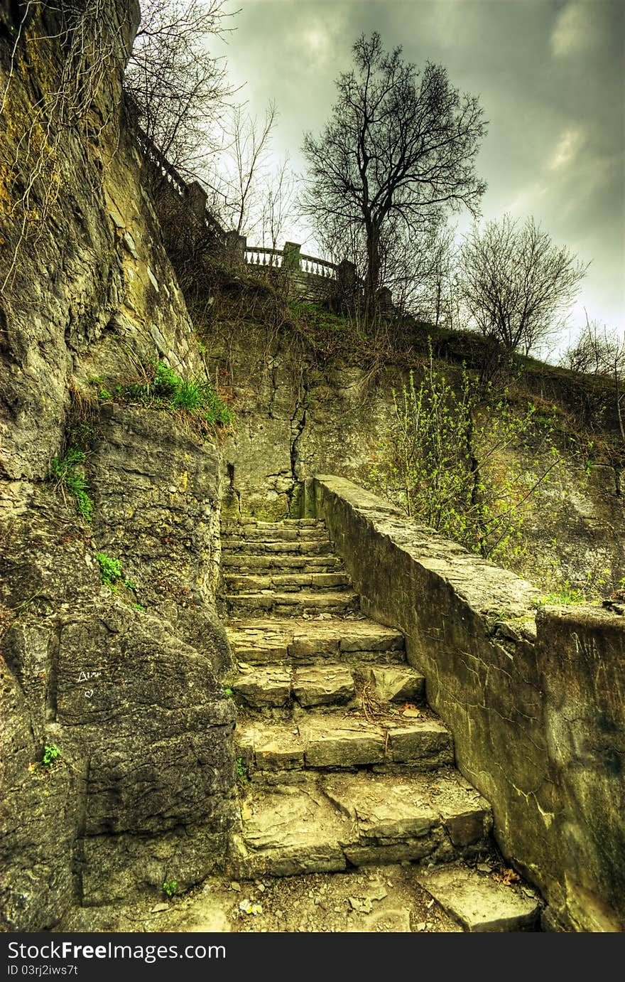 Ancient stairs with dramatic sky at background. Ancient stairs with dramatic sky at background