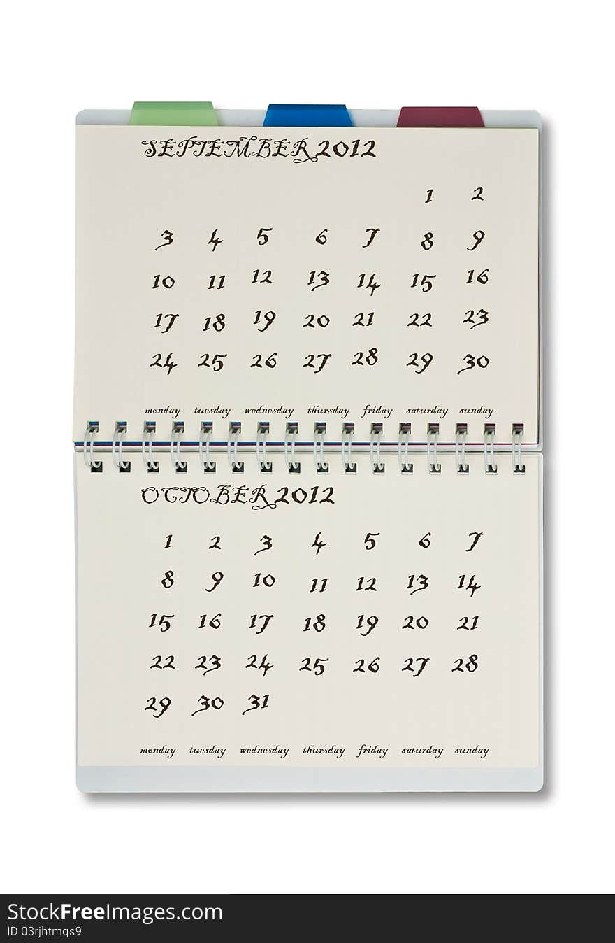 The 2012 calendar on notepad with white background.