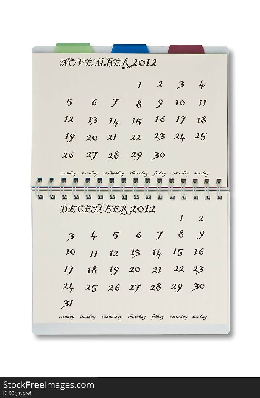 The 2012 calendar on notepad with white background.