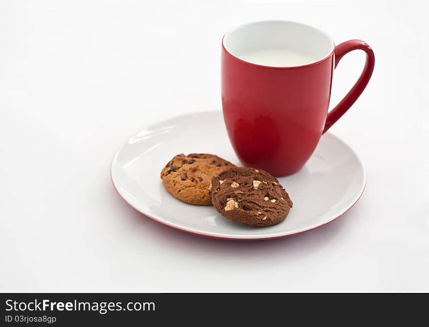 Cookies with milk in red mug