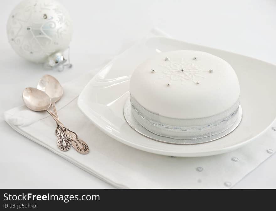 Christmas cake, decorated, on ehite background