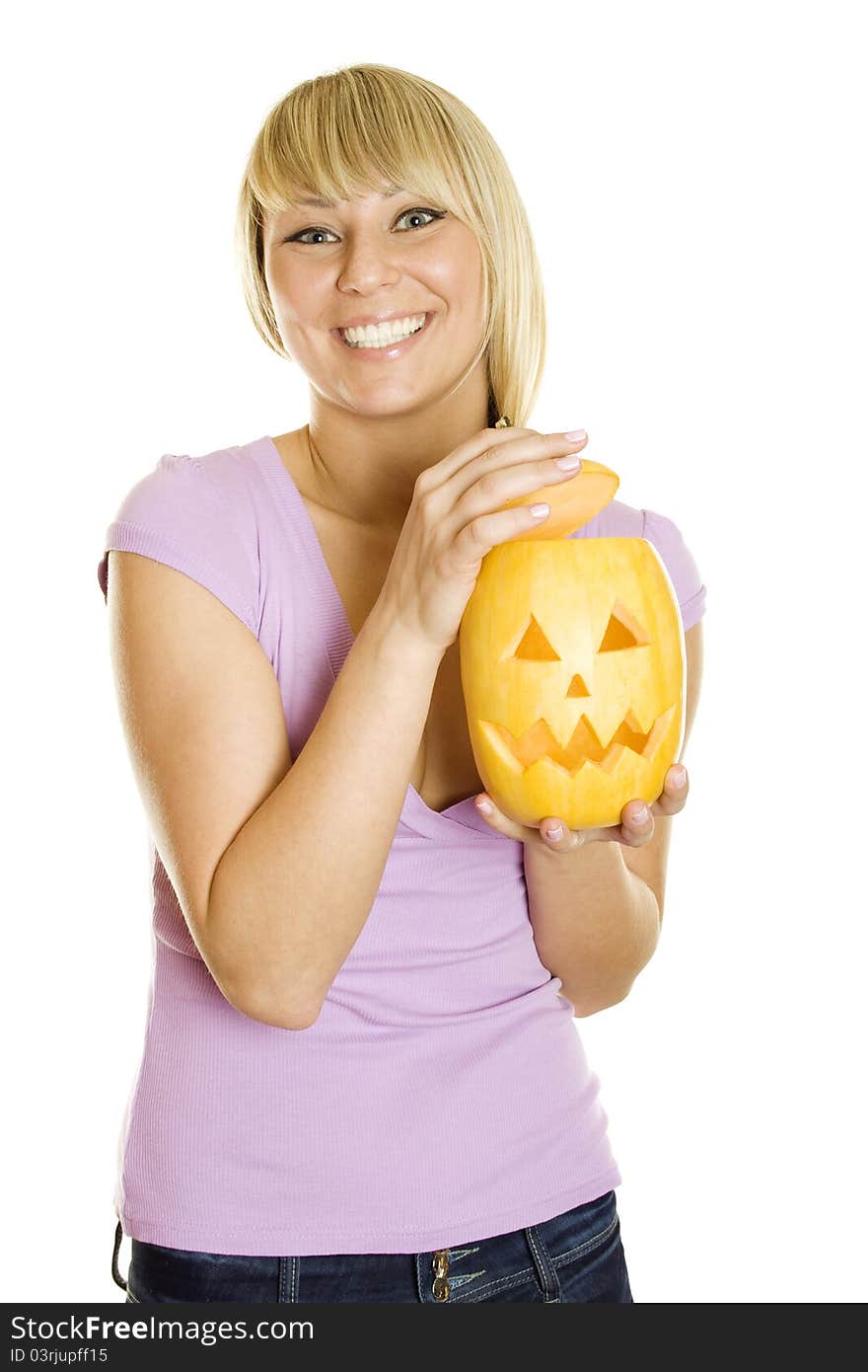 Young girl having fun with a pumpkin on Halloween. Lots of copyspace and room for text on this isolate. Young girl having fun with a pumpkin on Halloween. Lots of copyspace and room for text on this isolate