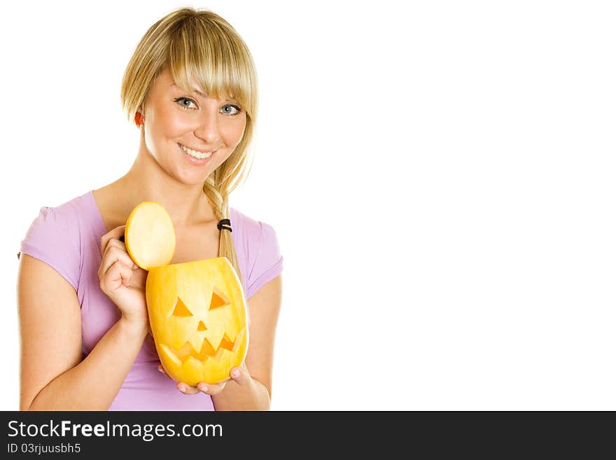 Young girl having fun with a pumpkin on Halloween. Lots of copyspace and room for text on this isolate. Young girl having fun with a pumpkin on Halloween. Lots of copyspace and room for text on this isolate