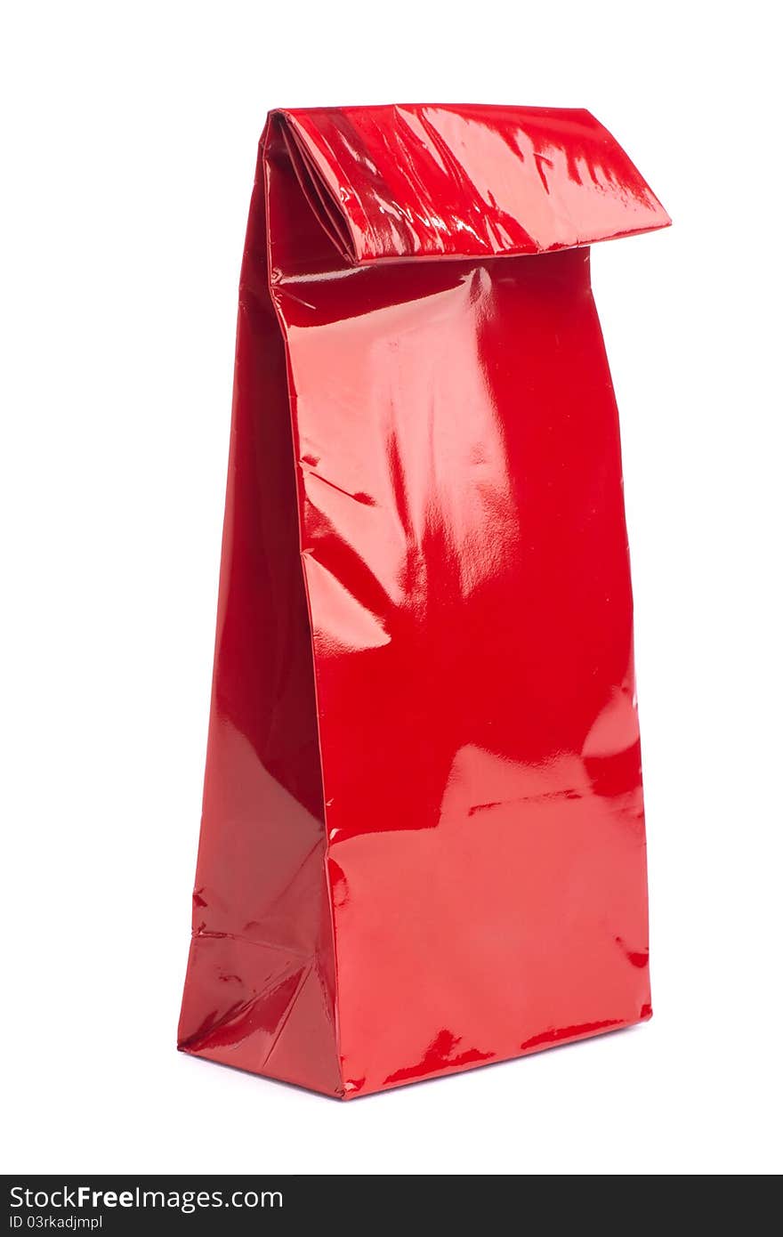 Studio shot of red tea pack isolated on white