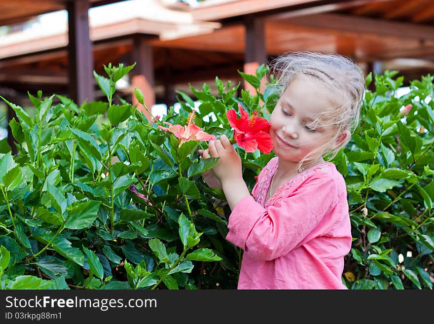 Beautiful girl with flower outdoor