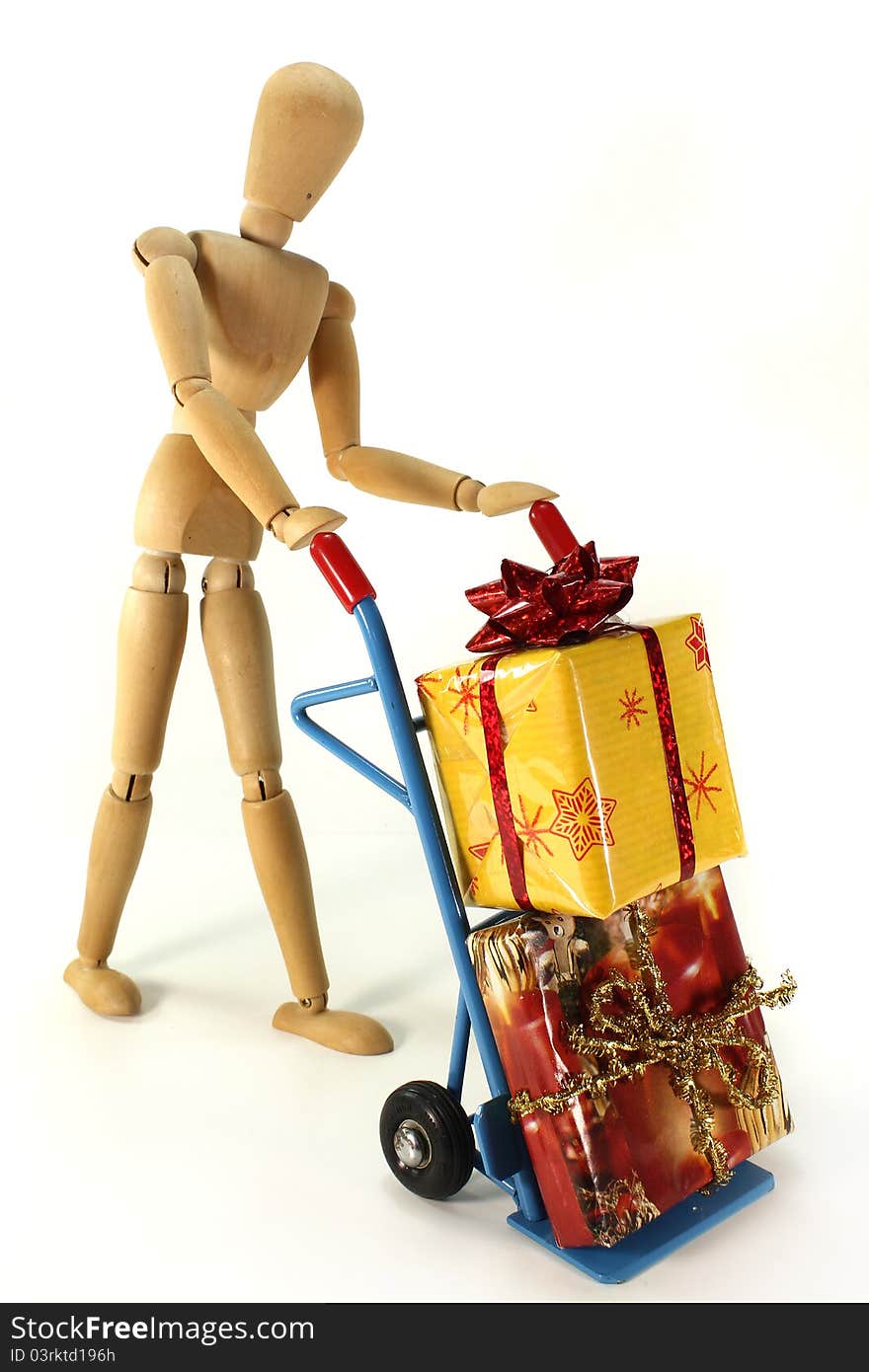 Colorful Christmas presents on a hand truck. Colorful Christmas presents on a hand truck