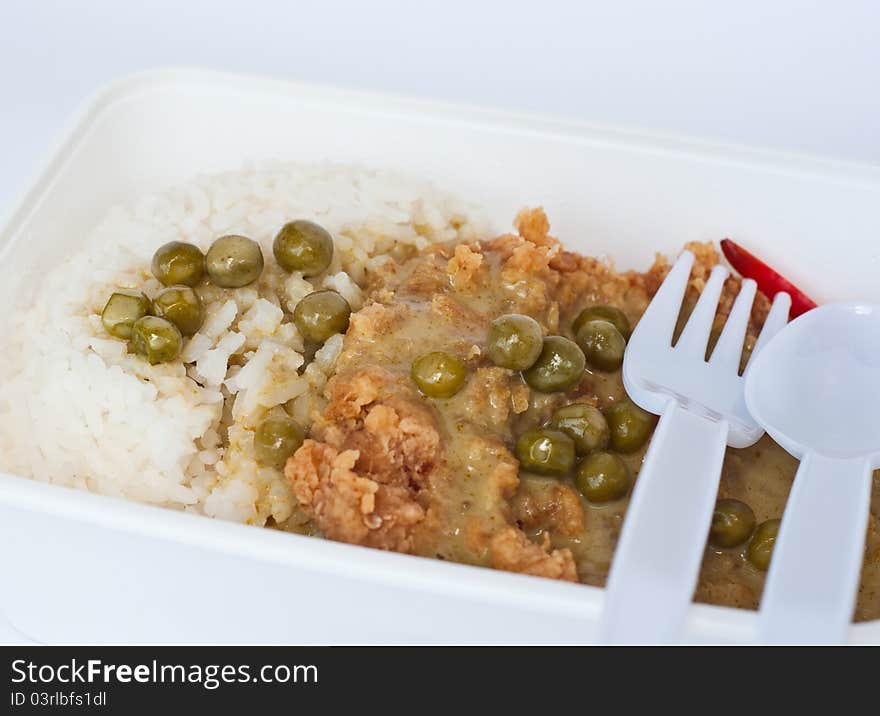 Chicken green curry in white meal box. Chicken green curry in white meal box