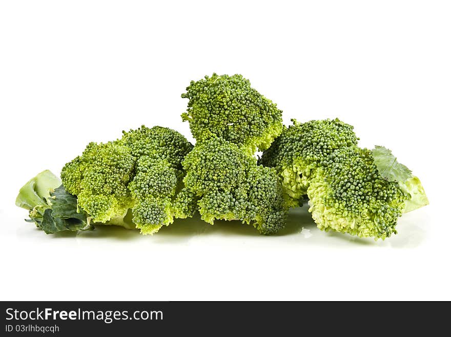 Fresh broccoli on white with soft shadow