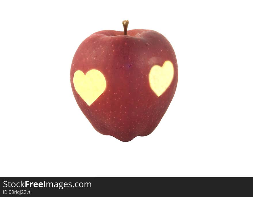 Red apple with hearts on it on the white background