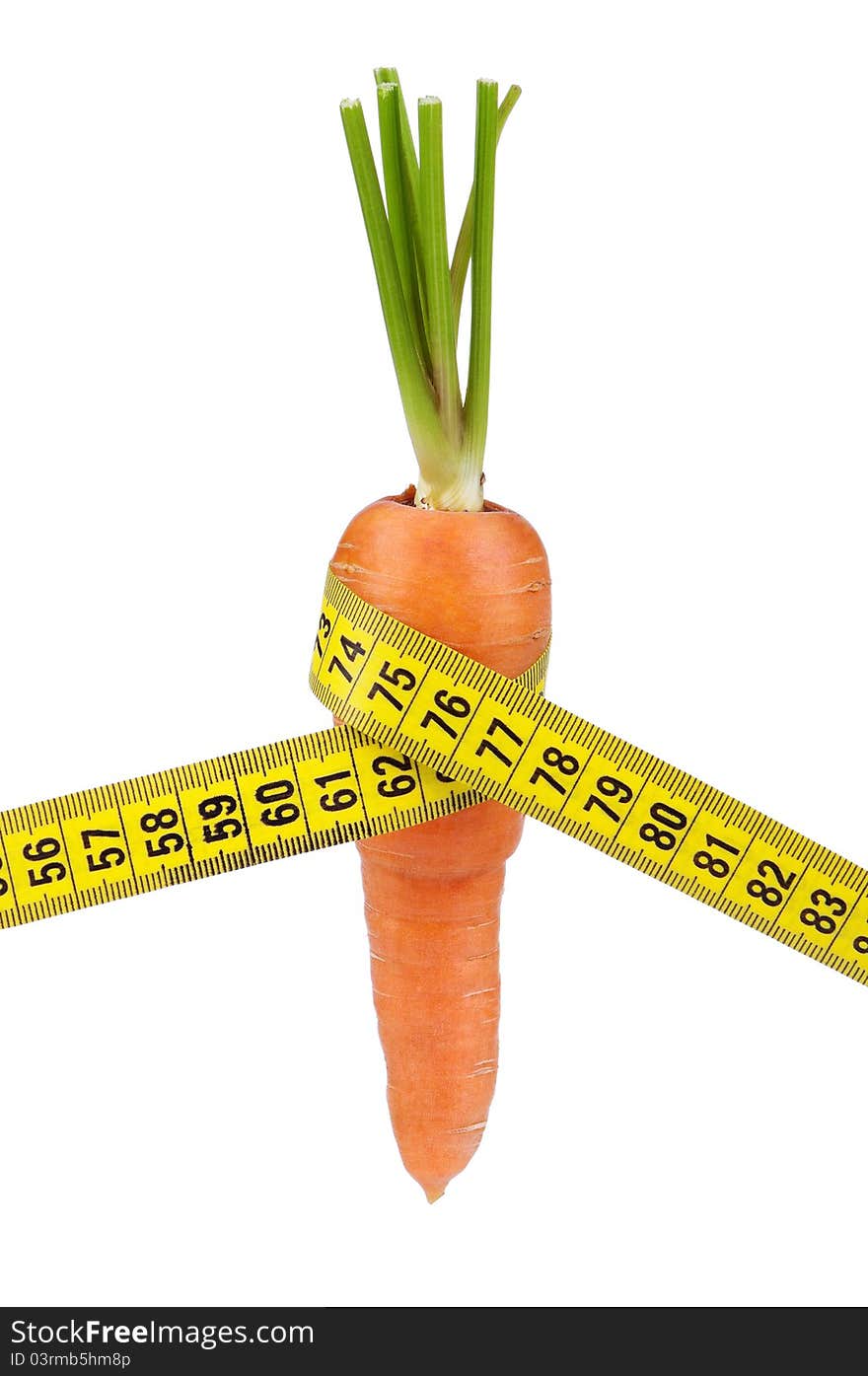 Carrot with a measure tape wrapped around isolated over a white background. Carrot with a measure tape wrapped around isolated over a white background